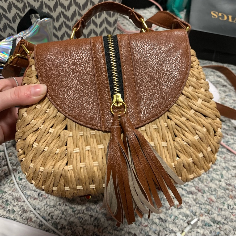 Brown woven tassle cross body purse